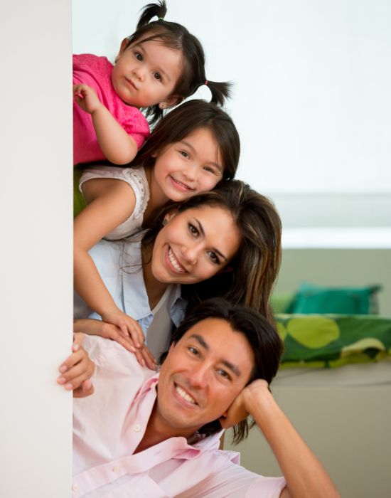 happy family playing inside home