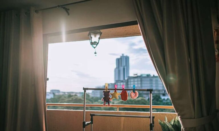 how-to-hang-outdoor-curtains-on-balcony