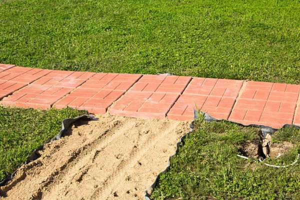 Framing the Driveway with Brick Borders