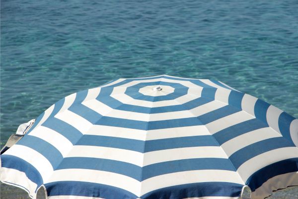 Tips for Adjusting and Positioning Your Umbrella to Block the Wind
